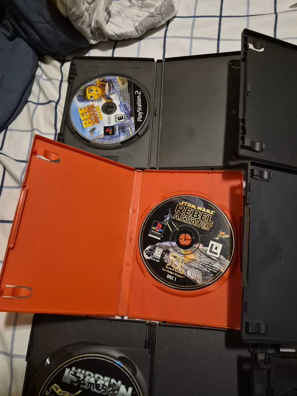 Sony PlayStation 2 Game Disc Bundle with Black and Red Cases. Lot Of 6